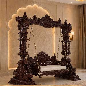 Teak wood swing, Hand carved teak wood swing, Luxury wooden swing, Premium teak wood jhula, Traditional Indian swing, South Indian wooden swing, Royal teak wood jhula, Handcrafted wooden swing, Heritage style swing, Temple carving wooden swing, Designer teak wood swing, Indoor wooden jhula, Living room wooden swing, Wooden swing for home, Luxury home swing, Antique carved swing, Maharaja style swing, Palace style wooden swing, Classic wooden swing, Solid teak wood furniture, Premium handcrafted furniture, Wooden hanging swing, Decorative teak wood swing, Luxury wooden furniture, Indian handcrafted furniture, Traditional home décor, Wooden porch swing, Home temple style swing, Heavy carved wooden swing, Designer home jhula, Luxury foyer swing, Wooden swing with carved pillars, Wooden swing with brass chain, Premium living room furniture, Artisan carved swing, Vintage wooden swing, Luxury interior furniture, Handcrafted teak furniture, Indian heritage furniture, Wooden sofa swing, Royal home décor, Exclusive teak wood jhula, Luxury handcrafted swing, Elegant wooden swing, High-end wooden furniture, Solid wood swing chair, Custom teak wood swing, Wooden swing manufacturer, Wooden swing exporter, Teak wood furniture manufacturer India, Wooden furniture exporter India, DST Exports teak swing, Premium home furniture, Traditional carved furniture, Luxury wooden interior décor, Custom wooden swing, Export quality teak wood swing, South Indian design swing, Ornate teak wood swing, Royal carved jhula.